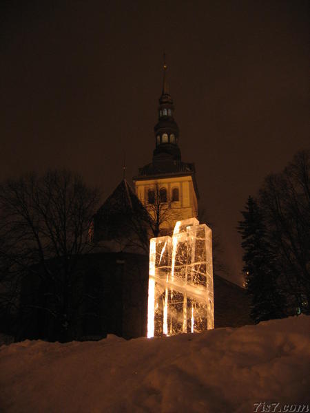 Tallinn Niguliste church behind ice sculpture at night