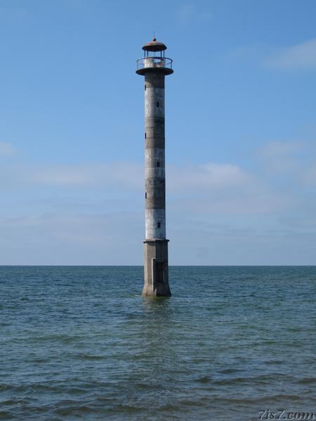 Photo of Kiipsaar lighthouse surrounded by water