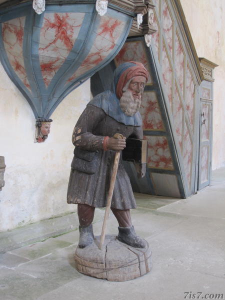 Wooden sculpture of old man