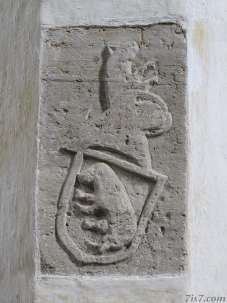 Reliefs on Kaarma church symbol