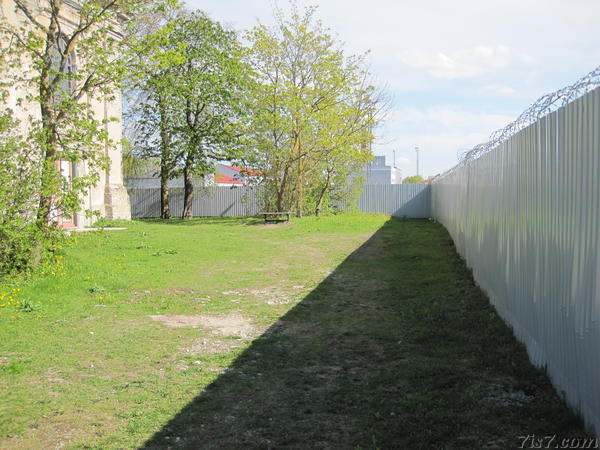 Barbeb wired fence around church