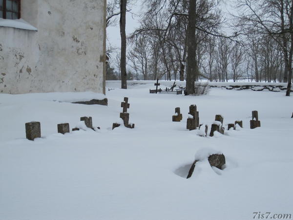 Ridala church tombstones in winter