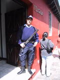 Guard with gun