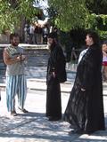 Monks and Visitor in Monastery Dress