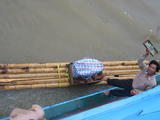 Locals on a Raft Selling Goods