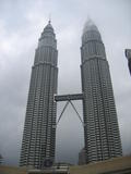 Petronas Towers Scraping Clouds